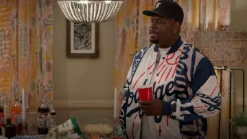 Pro Standard Los An­ge­les Dodgers Mash Up Satin Jacket worn by Sherm Jones (Carl Tart) as seen in Grand Crew (S02E03)