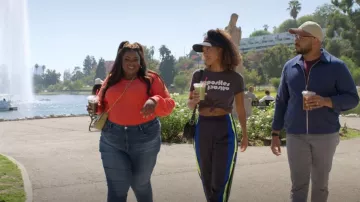 Zac Zac Posen Belay Mini Saddle Crossbody Bag worn by Nicky (Nicole Byer) as seen in Grand Crew (S02E03)