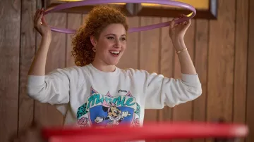 Minnie Florida sweatshirt in white worn by Babbette (Greta Gerwig) as seen in White Noise movie wardrobe
