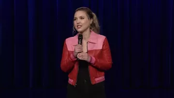 Red and pink leather jacket worn by Taylor Tomlinson as seen in The Tonight Show Starring Jimmy Fallon