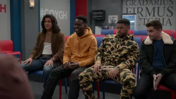 Nike orange hoodie worn by Sam Obisanya (Toheeb Jimoh) as seen in Ted Lasso TV series outfits (S03E03)