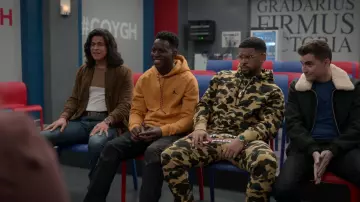 Nike orange hoodie worn by Sam Obisanya (Toheeb Jimoh) as seen in Ted Lasso TV series outfits (S03E03)