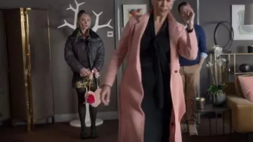 Jayley Pink Faux Fur Love Heart Bag worn by Keeley Jones (Juno Temple) as seen in Ted Lasso (S03E03)