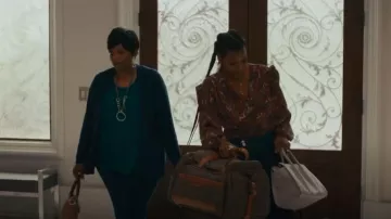 Tods Bauletto Leather Top Bag worn by Vivian Banks (Cassandra Freeman) as seen in Bel-Air (S02E06)