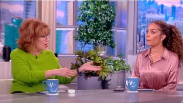 L'Agence Cammi Belted Plissé-satin Maxi Shirt Dress worn by Sunny Hostin as seen in The View on March 30, 2023