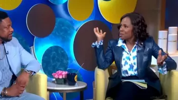 Carolina Herrera Puff Sleeve Shirt worn by Deborah Roberts as seen in Good Morning America on April 4, 2023