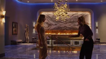 Jonathan Simkhai Sequined Sleeveless Wrap Dress worn by Cassie Bowden (Kaley Cuoco) as seen in The Flight Attendant (S02E01)