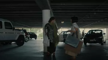 Bao Bao Issey Miyake Ton­neau Mat­te Hand­bag worn by Fumi Nakai (Patti Yasutake) as seen in BEEF (S01E08)