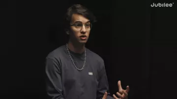 Ray-Ban glasses in gold worn by Amr in Can Satanists & Major Religions See Eye to Eye? | Middle Ground