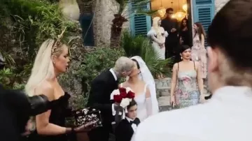 Dolce & Gabbana Hand Paint­ed Flo­ral Dress worn by Kylie Jenner as seen in ‘Til Death Do Us Part: Kourtney And Travis (S01E01)