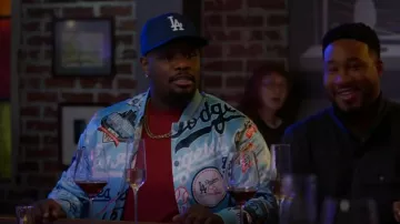 LA Licenced Gear Los Angeles Dodgers Pro Standard Royal Allover Print Satin Full-Snap Jacket worn by Sherm Jones (Carl Tart) as seen in Grand Crew (S02E07)