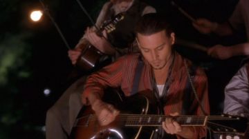 La guitarra Gretsch Modelo 35 de Roux (Johnny Depp) en Le Chocolat