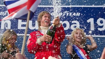 The bottle of Moët & Chandon open on the podium by James Hunt (Chris Hemsworth) in Rush