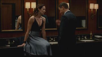 The dress blue satin from Elise Sellas (Emily Blunt) in The Agency