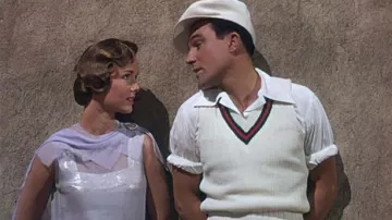 The white V-neck sweater worn by Don Lockwood (Gene Kelly) in the movie Singing in the Rain
