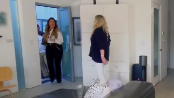 Veronica Beard Dalida Button Detail Skinny Flare Jeans worn by Emily Simpson as seen in The Real Housewives of Orange County (S16E09)