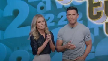 Saint Laurent Tie-Neck Striped Metallic Silk-Blend Shirt worn by Kelly Ripa as seen in LIVE with Kelly and Mark on  April 20, 2023