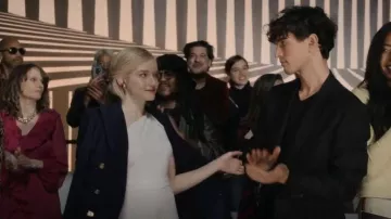 Jonathan Simkhai Al­ice Blouse worn by Anna Delvey (Julia Garner) as seen in Inventing Anna (S01E02)