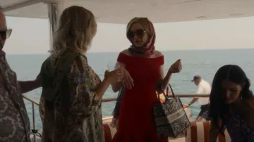 Alexander Mcqueen Ruf­fled Hem Off-shoul­der Dress worn by Anna Delvey (Julia Garner) as seen in Inventing Anna (S01E02)