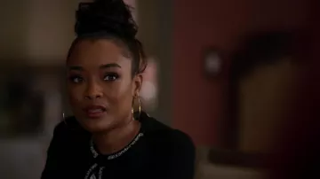 Alexander Wang logo-tape cropped cardigan in Black worn by Diana Tejada (LaToya Tonodeo) as seen in Power Book II: Ghost (S03E06)