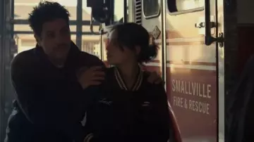 Coach Var­si­ty Jack­et worn by Sarah Cushing (Inde Navarrette) as seen in Superman & Lois (S03E06)