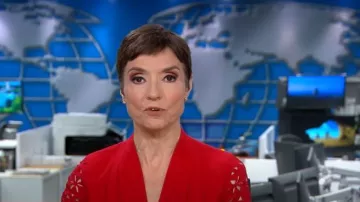 Elie Tahari Robe à manches brodées portée par Catherine Herridge vue dans CBS Mornings le 27 avril 2023