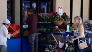 Coach Embossed Bleecker Bag worn by Jerusha (Kerri Kenney-Silver) as seen in Superstore (S01E03)