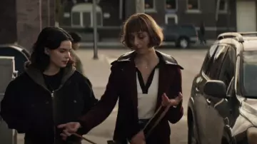 Alice + Olivia Pia Ribbed Po­lo Shirt worn by Chrissy Beppo (Sofia Hasmik) as seen in Superman & Lois (S03E07)