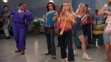 Prada Sheer Silk Yellow Flower Blouse portée par Elle Woods (Reese Witherspoon) dans le film Legally Blonde