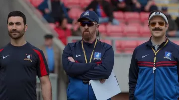 Oakley Ev Zeo Ascend White Prizm Road worn by Coach Beard (Brendan Hunt) as seen in Ted Lasso (S03E09)