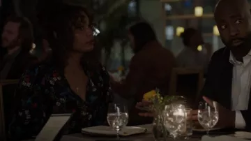Alice + Olivia Ilan Smocked Flo­ral Blouse worn by Grace Ryder (Sierra McClain) as seen in 9-1-1: Lone Star (S04E16)