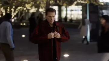 Red plaid zip jacket worn by Rob Burns (Sam Heughan) as seen in Love Again