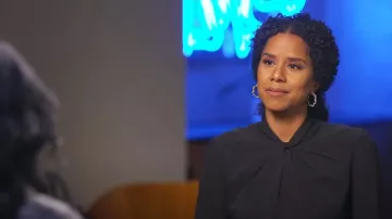 Club Monaco Twist Neck Top In Black worn by Adriana Diaz as seen in CBS Mornings on May 15, 2023