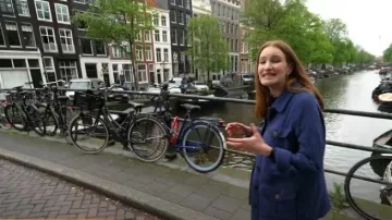 Sezane Paulin Coat in Vintage Blue worn by Haley Ott as seen in CBS Mornings on May 17, 2023