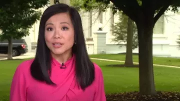 Shein Unity Cross Wrap Front Bishop Sleeve Top worn by Weijia Jiang as seen in CBS Mornings on May 17, 2023