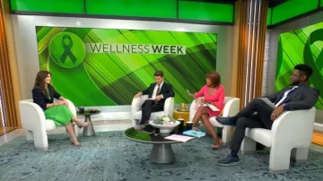 Maggy London Halter Neck with Circle Trim Detail Cotton Poplin Dress worn by Christy A Harrison as seen in CBS Mornings on May 17, 2023