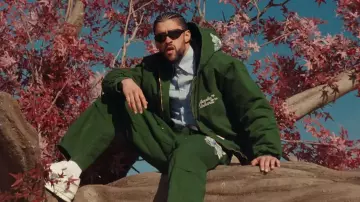 Carharrt x Awake NY green hood Jacket worn by Bad Bunny in his WHERE SHE GOES music video