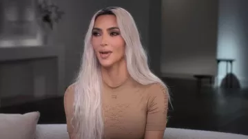 Balenciaga Sporty B Crew­neck Short Sleeve Athletic Top In Beige worn by Kim Kardashian as seen in The Kardashians (S03E01)