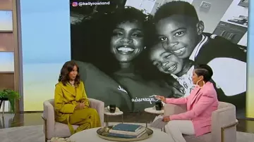 Saint Laurent Satin Wide-Leg Pants worn by Kelly Rowland as seen in Tamron Hall on June 2, 2023