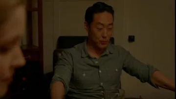J Crew Sport­ing Goods Blue Selvedge Cham­bray Work Shirt worn by Howie 'Chimney' Han (Kenneth Choi) as seen in 9-1-1 (S01E03)