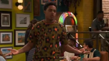 Kenzo Leop­ard-Print Short-Sleeve T-Shirt worn by Booker Baxter (Issac Ryan Brown) as seen in Raven's Home (S06E09)