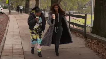 Christian Louboutin Knit Dovi Do­va 100 Stud­ded Sock Boot worn by Shereé Whitfield as seen in The Real Housewives of Atlanta