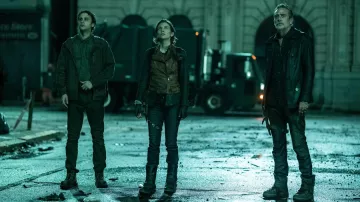 Leather boots worn by Maggie Rhee (Lauren Cohan) as seen in The Walking Dead: Dead City TV series (S01E01)