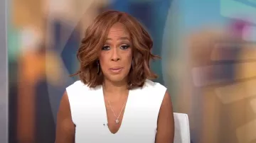 Fendi Knit V-Neck Dress worn by Gayle King as seen in CBS Mornings on June 30, 2023