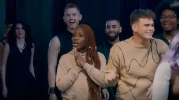 Primark Tan And Cream Hood­ie worn by Nancé Synthia Kabasélé as seen in Glow Up: Britain's Next Make-Up Star (S04E01)