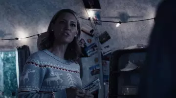 Unibelle Ug­ly Christ­mas Sweater worn by Joy Wallis (Andrea Anders) as seen in Cruel Summer (S02E05)