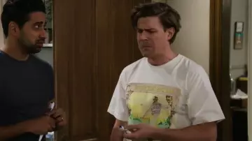 Daydreamer Elton John Yellow Brick Road Tee worn by Jesse (Chris Lowell) as seen in How I Met Your Father (S02E18)