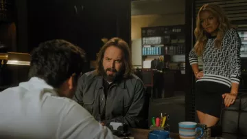 Fendi Zucca Monogramme Noir Blanc Ruban Laced Sleeve Sweater worn by Lorna (Becki Newton) as seen in The Lincoln Lawyer (S01E08)