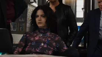 Ganni Print­ed Mesh Turtle­neck Top worn by Detective Jet Slootmaekers (Ainsley Seiger) as seen in Law & Order: Organized Crime (S03E22)