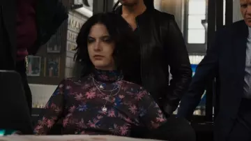Ganni Print­ed Mesh Turtle­neck Top worn by Detective Jet Slootmaekers (Ainsley Seiger) as seen in Law & Order: Organized Crime (S03E22)
